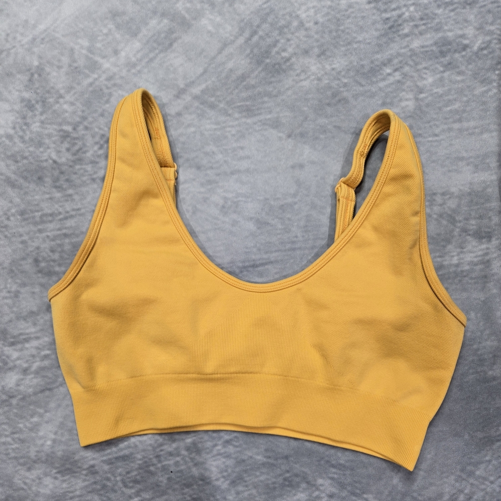 BO+TEE sports bra features a lined, compressed design with adjustable straps